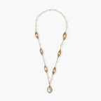 14K gold plated necklace with organic leaf motifs and freshwater pearls arranged in an elegant chain design on neutral background.