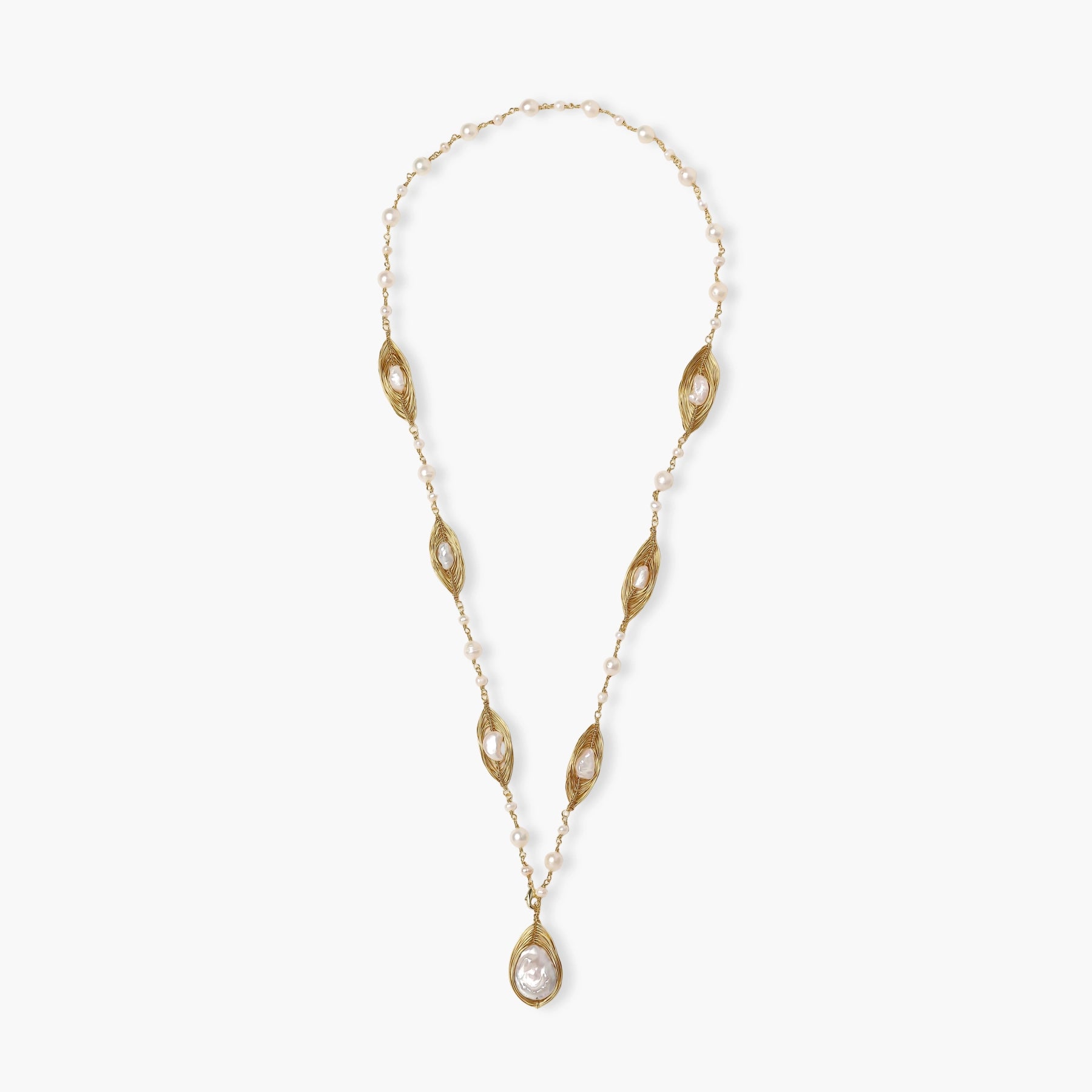 14K gold plated necklace with organic leaf motifs and freshwater pearls arranged in an elegant chain design on neutral background.