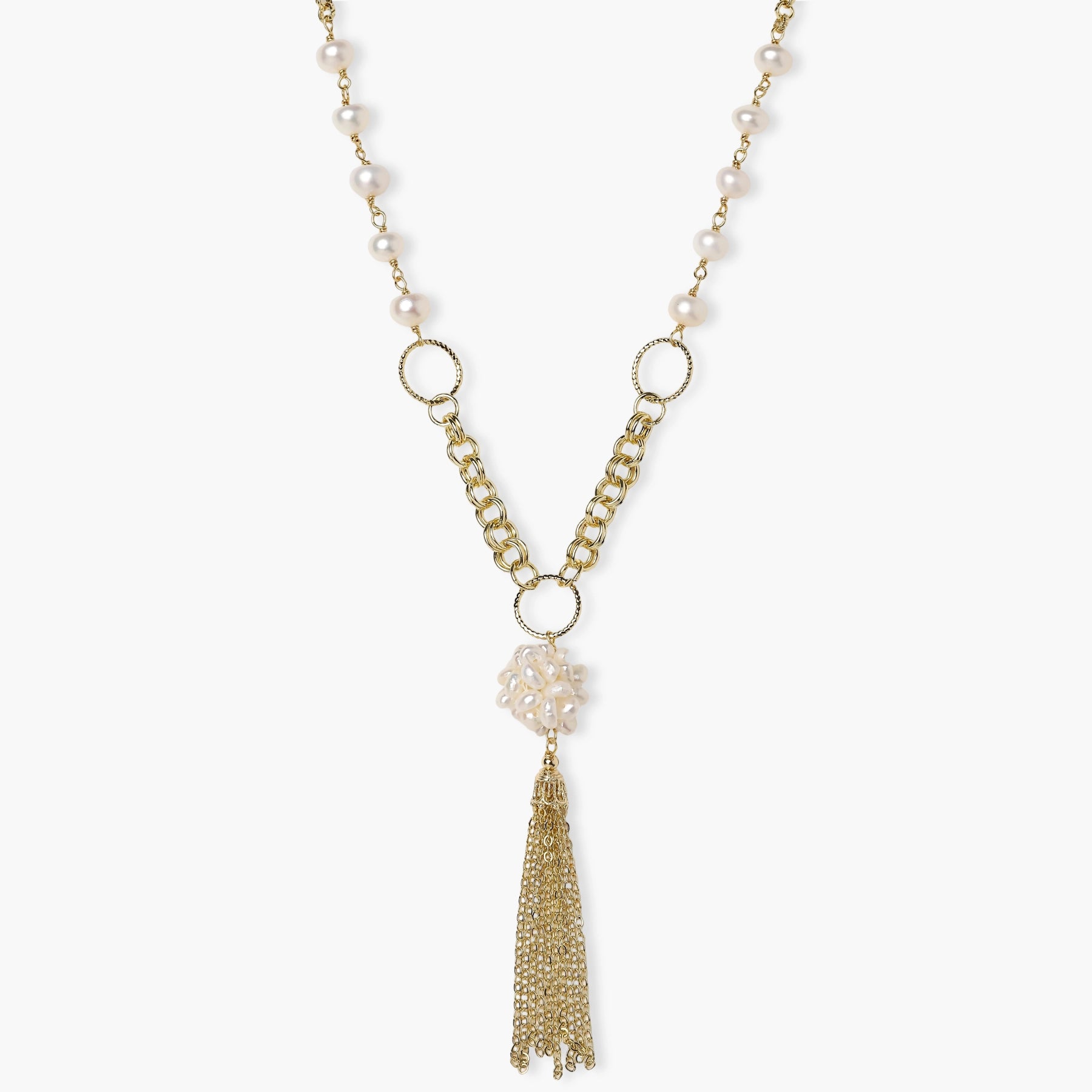 Long gold-plated necklace with freshwater pearls, chunky chain links, and flowing tassel pendant