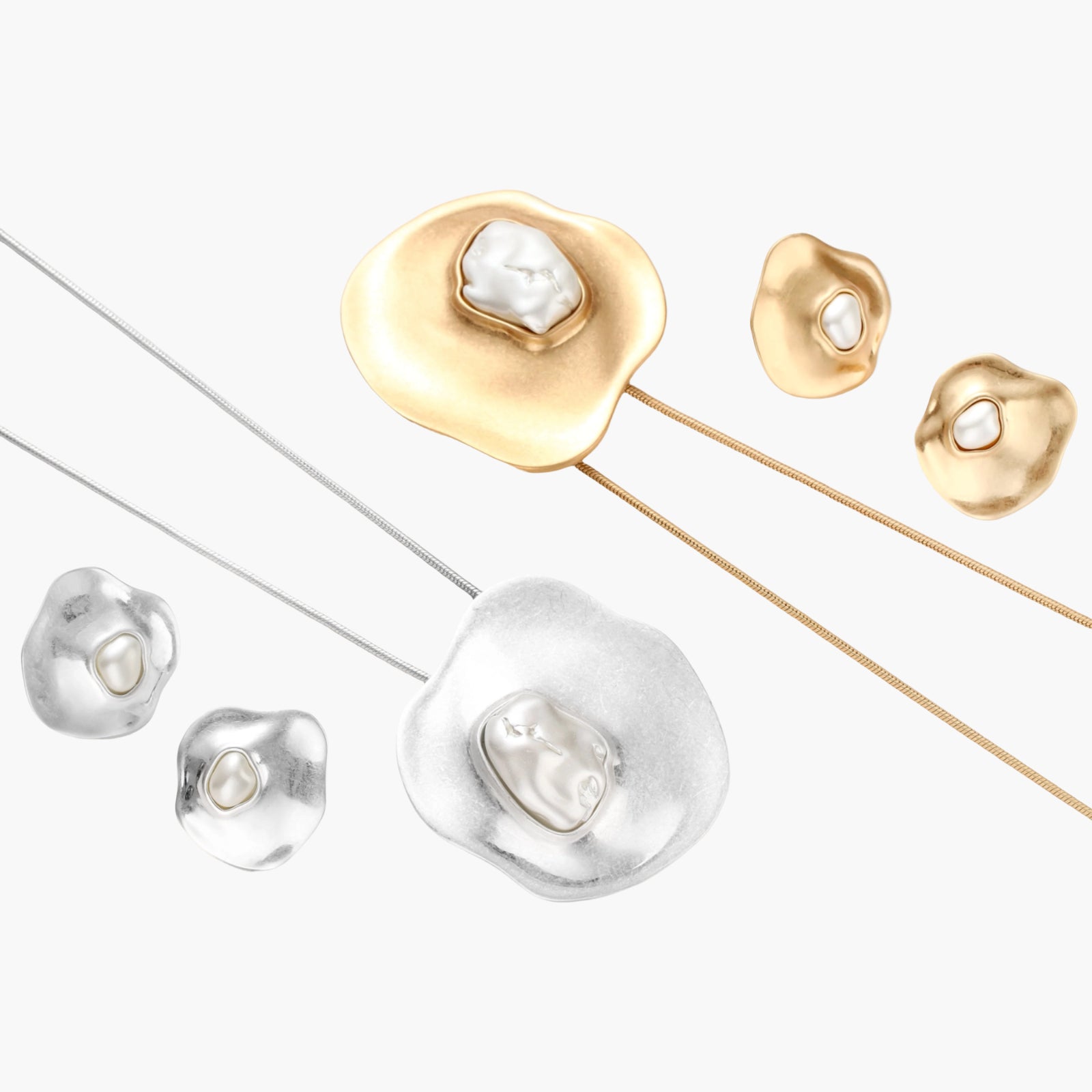 Organic-shaped gold pendant necklace with baroque pearl accent on adjustable chain, displayed against neutral background.