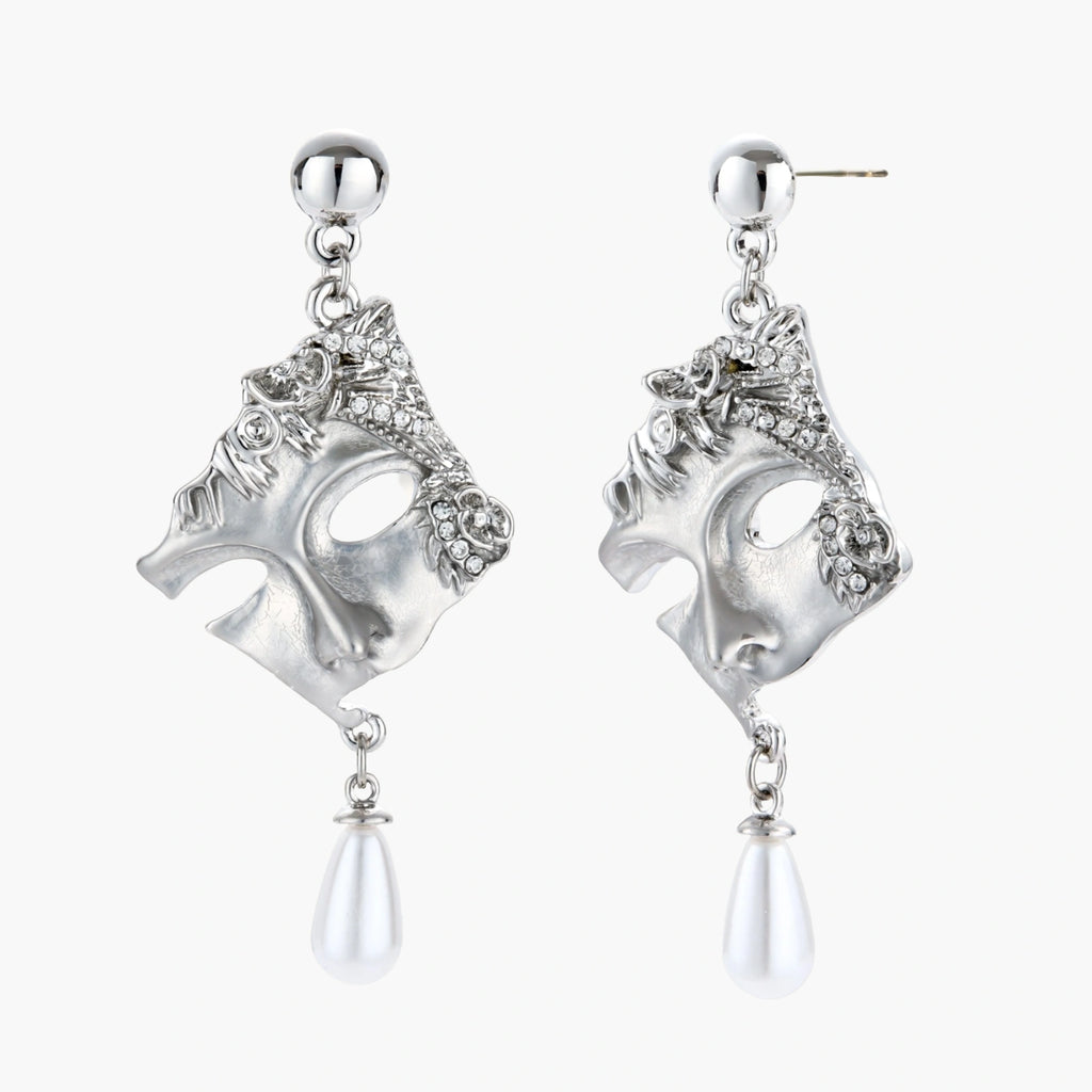 Ornate silver-toned masquerade mask jewelry set featuring rhinestone details and pearl drop earrings on white background.