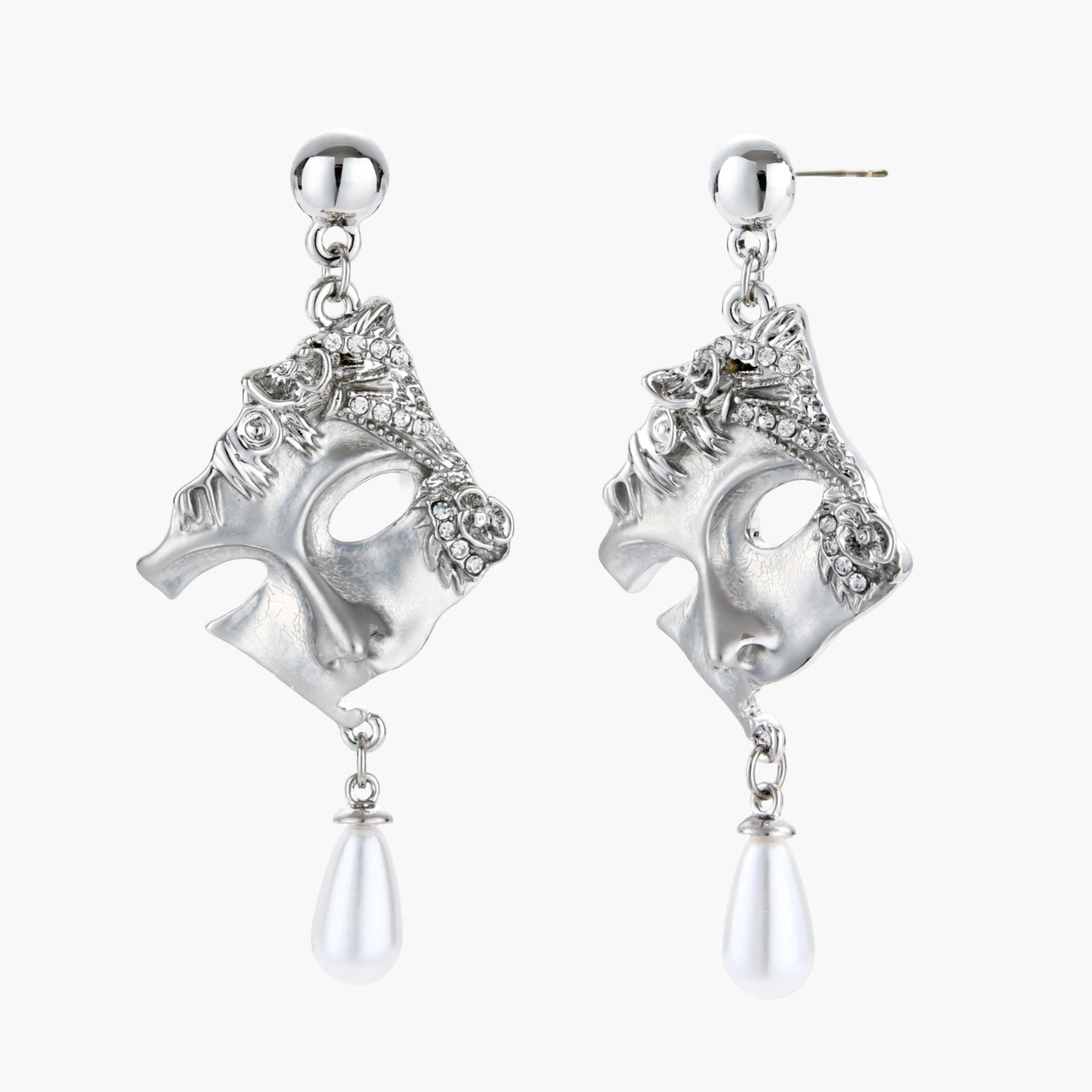 Ornate silver-toned masquerade mask jewelry set featuring rhinestone details and pearl drop earrings on white background.