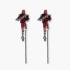 Gothic red resin dagger earrings with silver chain details and S925 posts on white background
