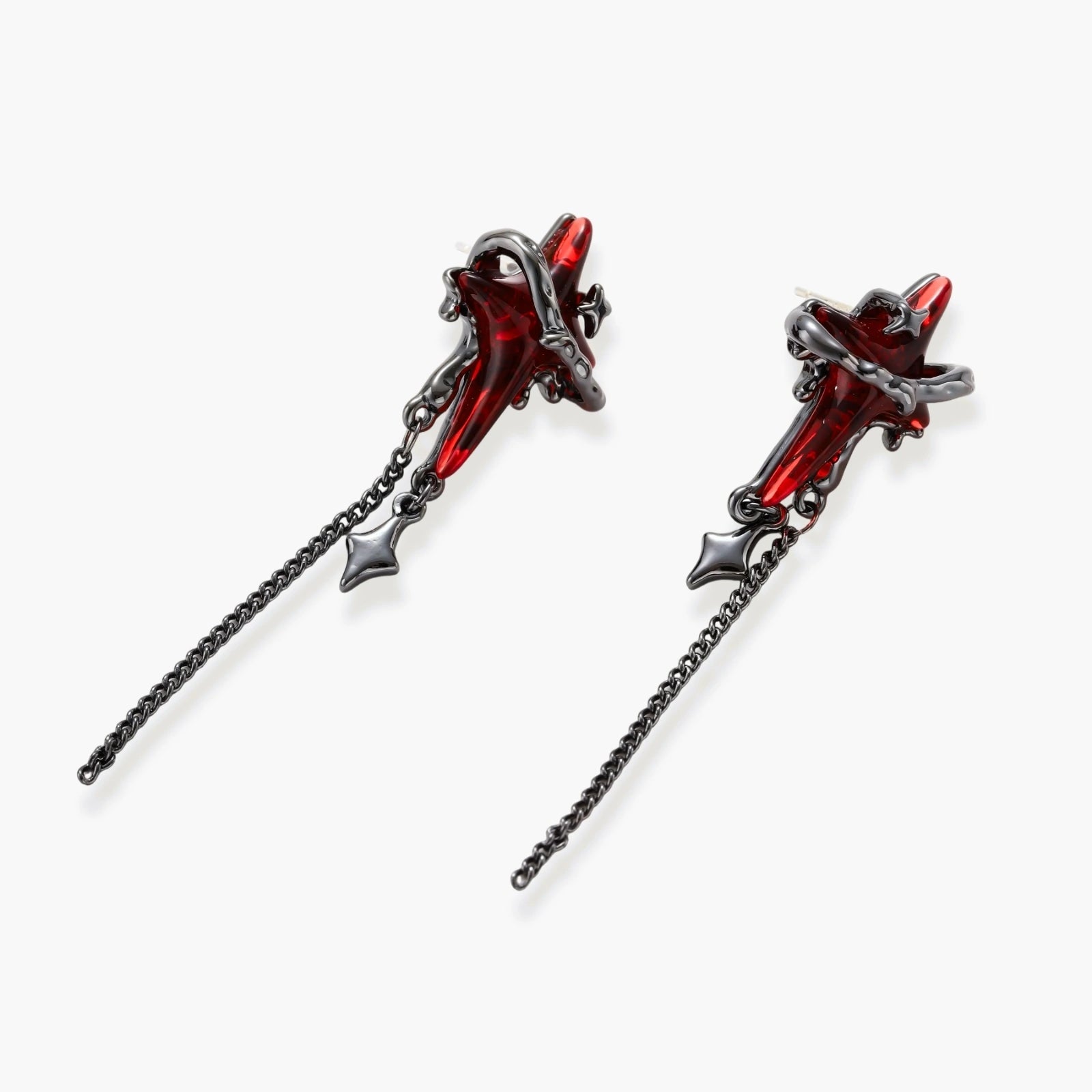 Gothic red resin dagger earrings with silver chain details and S925 posts on white background