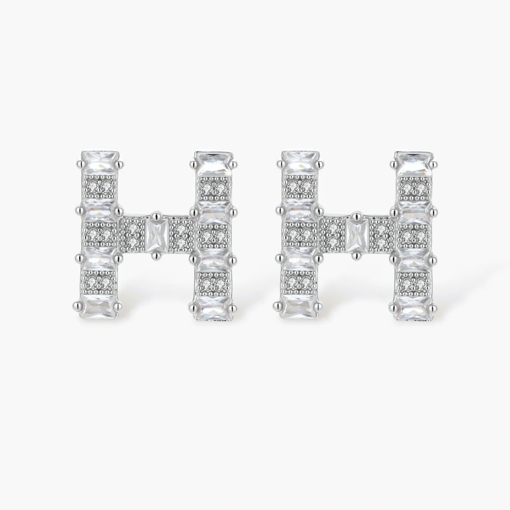 Letter H jewelry set featuring geometric crystal design in gold and white gold plated finish with adjustable chain necklace