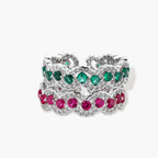 Platinum-plated copper ring with green zirconia stones in decorative scalloped wave pattern, adjustable band design.