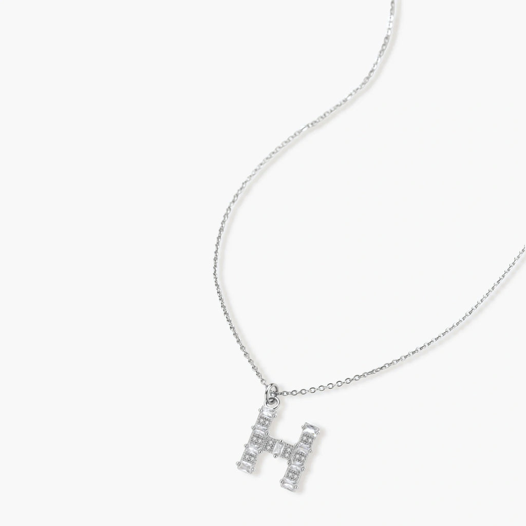 Letter H jewelry set featuring geometric crystal design in gold and white gold plated finish with adjustable chain necklace